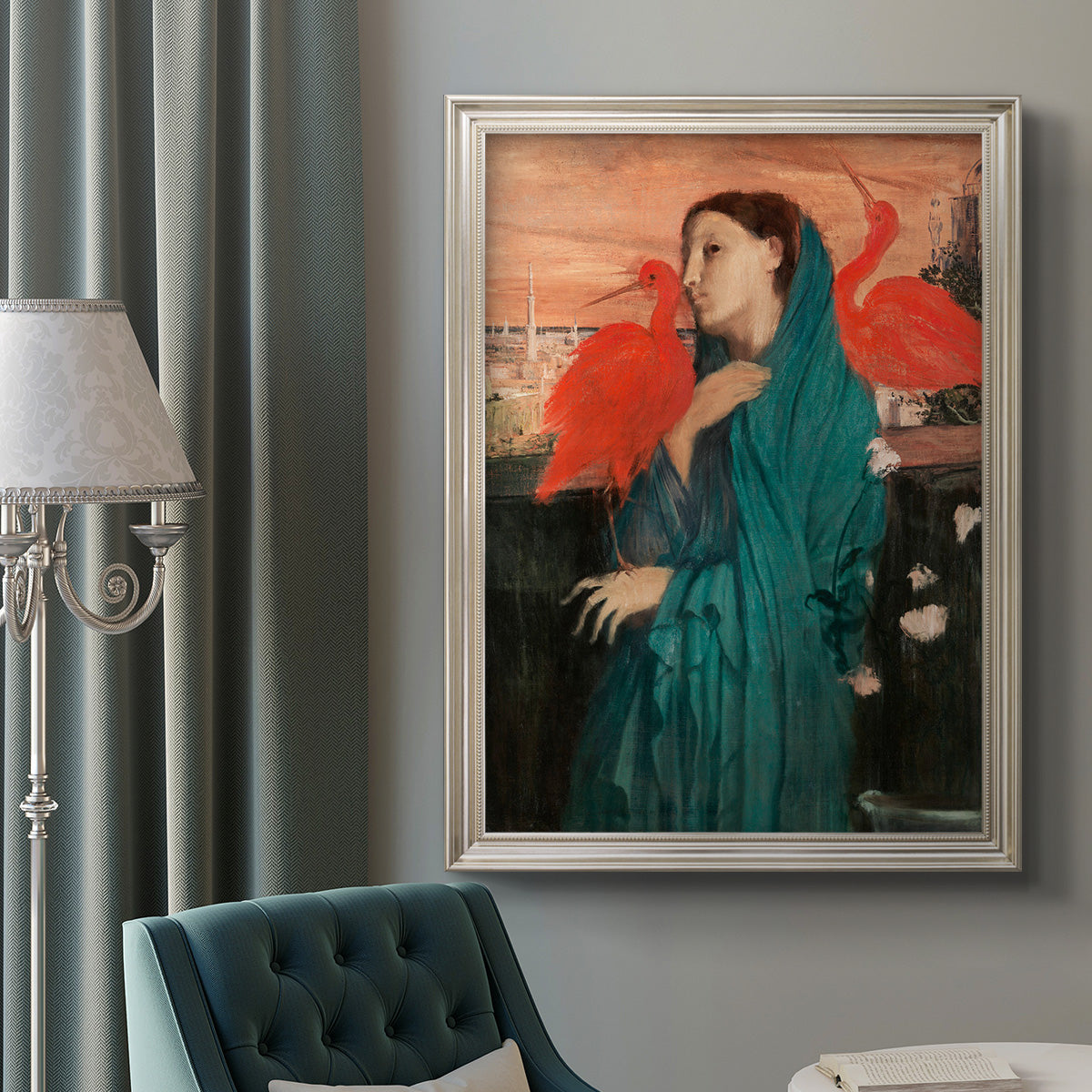 Impressionist portrait of a young woman with an ibis by Edgar Degas in an ornate champagne frame displayed in a neutral interior setting.