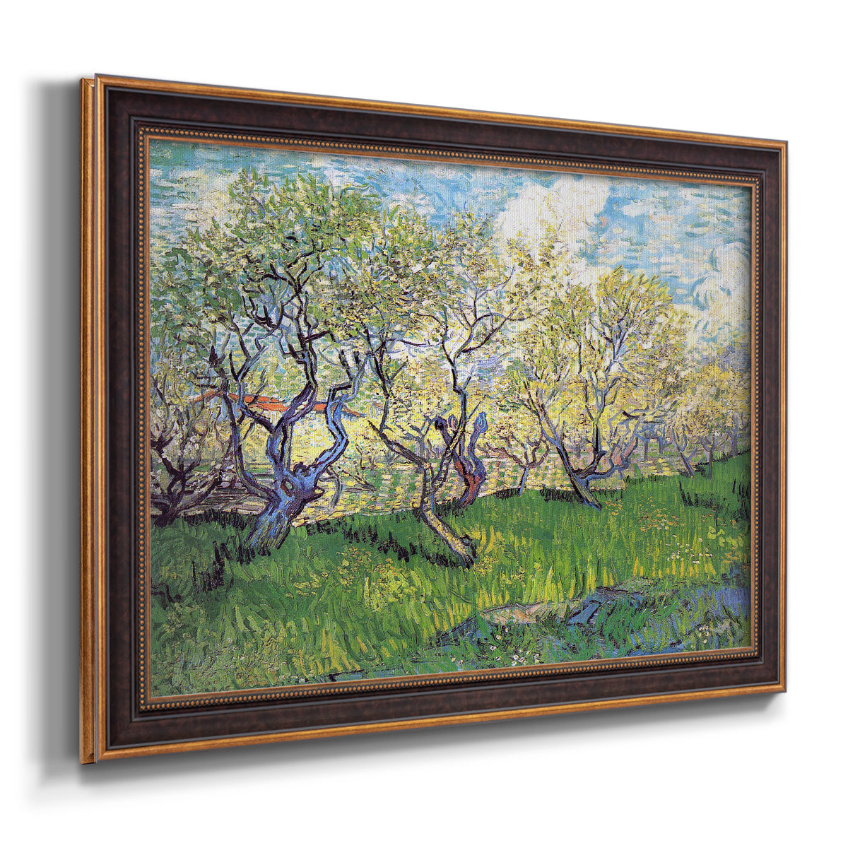 Impressionist spring orchard landscape by Vincent van Gogh printed on canvas in an ornate bronzed mahogany wood frame.