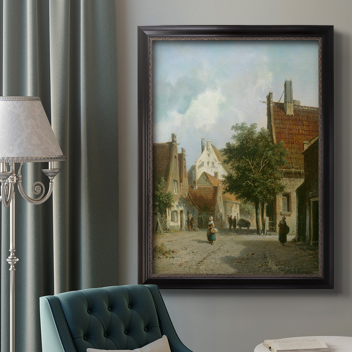Rustic European street scene painting by Adriaan Eversen in an ornate black frame with gilded inner detail displayed in a neutral interior setting.