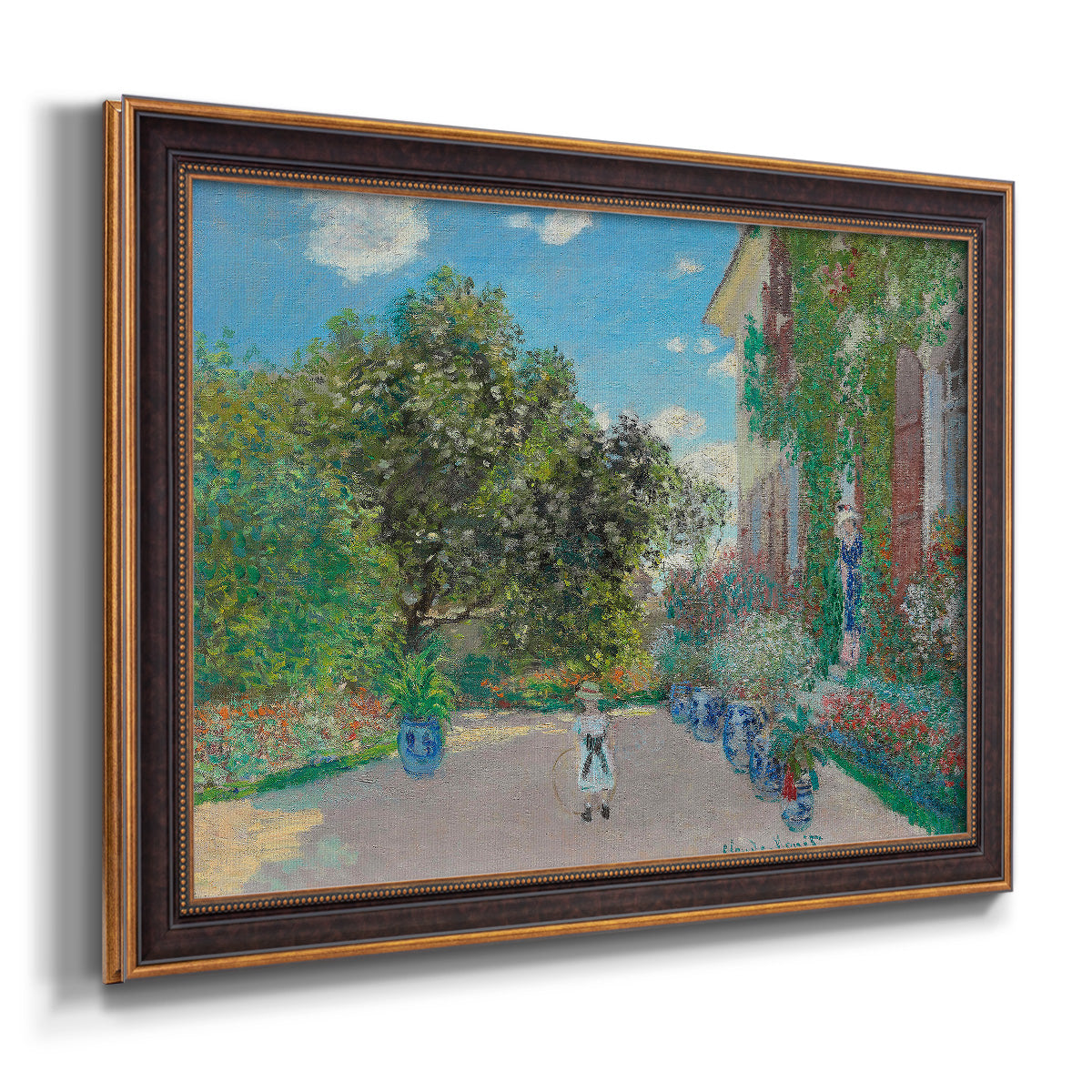 Impressionist residential landscape at Argenteuil by Claude Monet printed on canvas in an ornate bronzed mahogany wood frame.