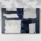 Modern abstract artwork showcasing contrasts with blue and white shapes on canvas