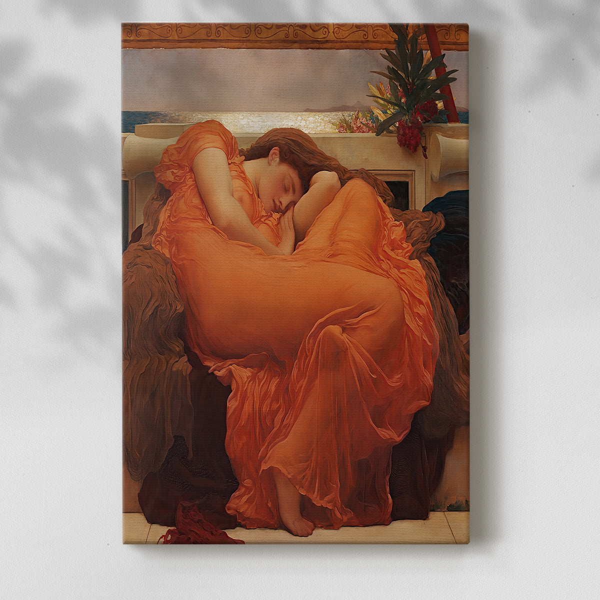 Canvas art print of a reclining figure wrapped in vibrant drapery with warm tones with a soft shadow on a white background.