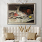 Impressionist still life painting of fish by Édouard Manet in an ornate champagne frame displayed in a neutral-toned interior setting.