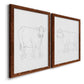 Angled view of a set of two maple barnwood framed canvas prints featuring two minimalist livestock sketches featuring simple contour drawings of standing cows.