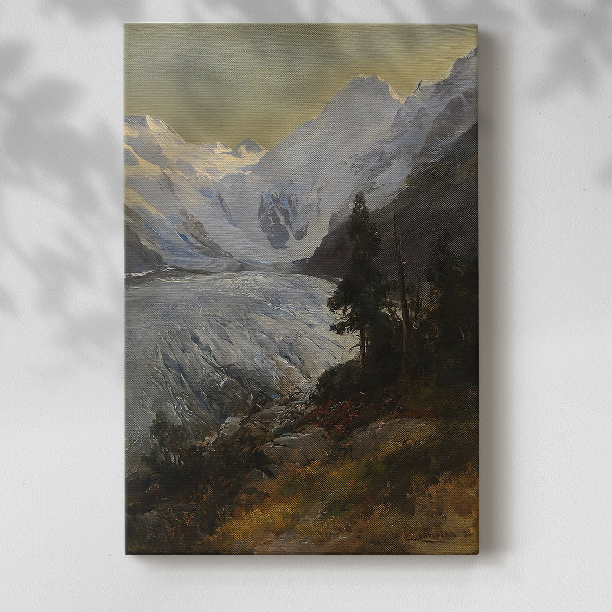 Canvas art print of a rugged alpine scene with snow-covered terrain and depth with a soft shadow on a white background.