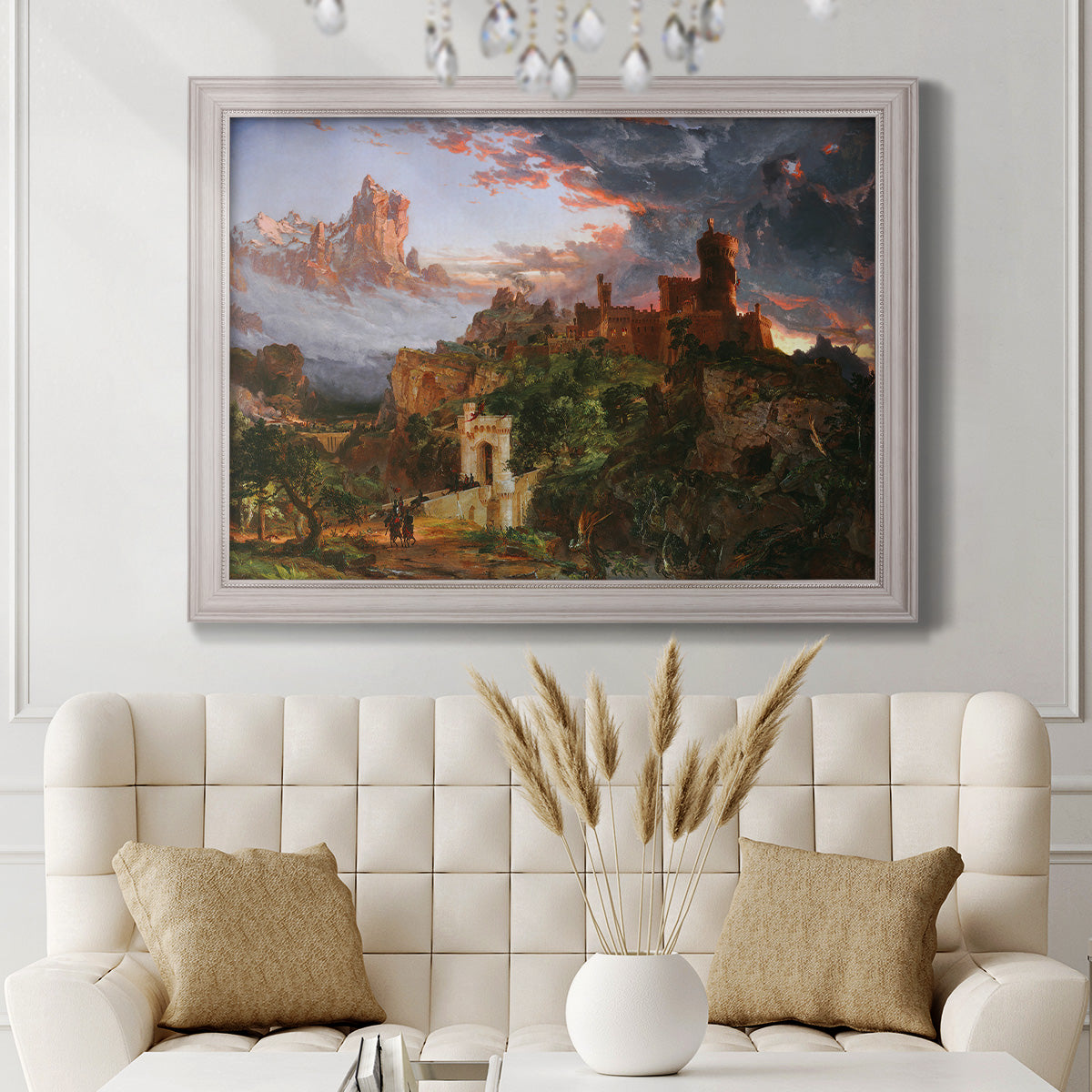 Romantic allegorical landscape painting by Jasper Francis Cropsey in an ornate weathered white frame displayed in a neutral-toned interior setting.