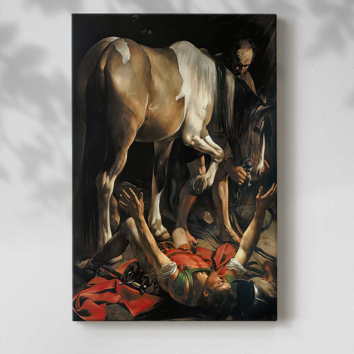 Canvas art print of a religious composition with a figure on the ground and strong contrast with a soft shadow on a white background.