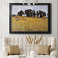 Impressionist rural harvest scene by John Singer Sargent in an ornate black frame with gilded inner detail displayed in a neutral-toned interior setting.