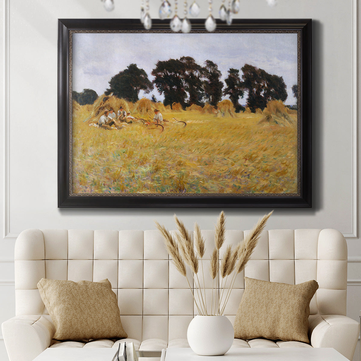 Impressionist rural harvest scene by John Singer Sargent in an ornate black frame with gilded inner detail displayed in a neutral-toned interior setting.