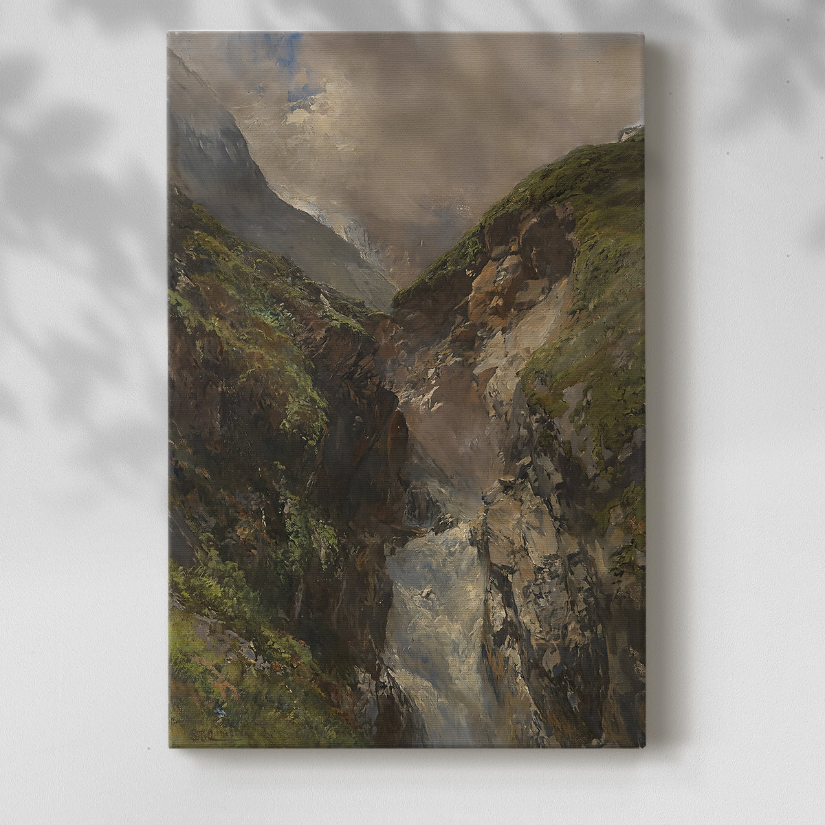 Canvas art print of a powerful waterfall rushing through a steep rocky valley with a soft shadow on a white background.