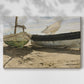 fishing boats,sandy beach,coastal scene,cloudy sky,early afternoon,rustic boats,seaweed,tranquil atmosphere,shoreline,nautical,ocean,watercraft,natural light,marine,weathered,shoreside,landscape,sandy shore,retreating tide,old boats,boat details,fishing,marine life,coastal landscape,seascape,relaxation,nature,scenery,heritage,local craftsmanship,wooden boats,traditional fishing,outdoor,solitude,calm waters,beach tranquility,environmental,nature's beauty,coastal art