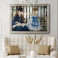 Impressionist urban scene near a railway by Édouard Manet in an ornate champagne frame displayed in a neutral-toned interior setting.