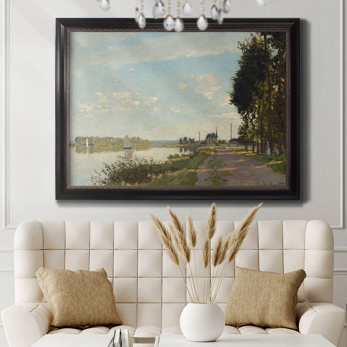 Impressionist river scene with red boats by Claude Monet in an ornate black frame with gilded inner detail displayed in a neutral-toned interior setting.