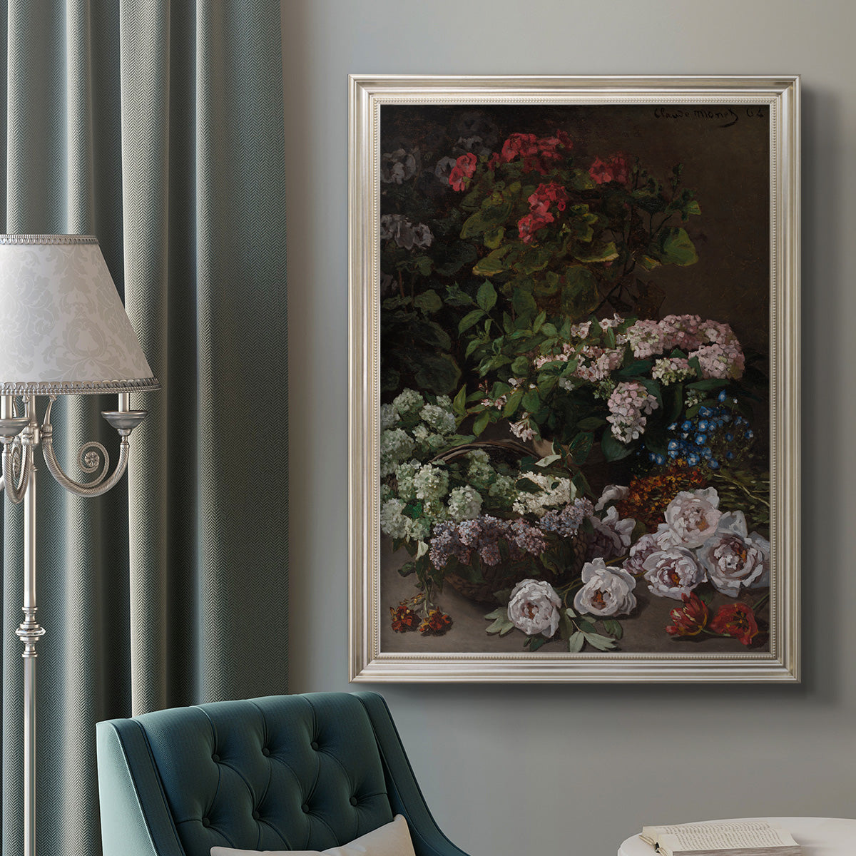 Early impressionist floral painting by Claude Monet in an ornate champagne frame displayed in a neutral interior setting.
