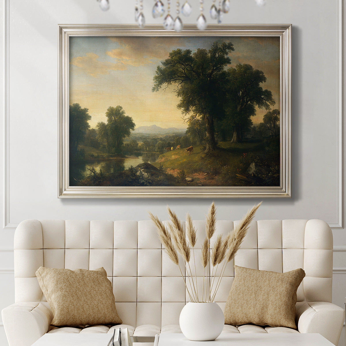 Traditional pastoral landscape painting by Asher Brown Durand in an ornate champagne frame displayed in a neutral-toned interior setting.