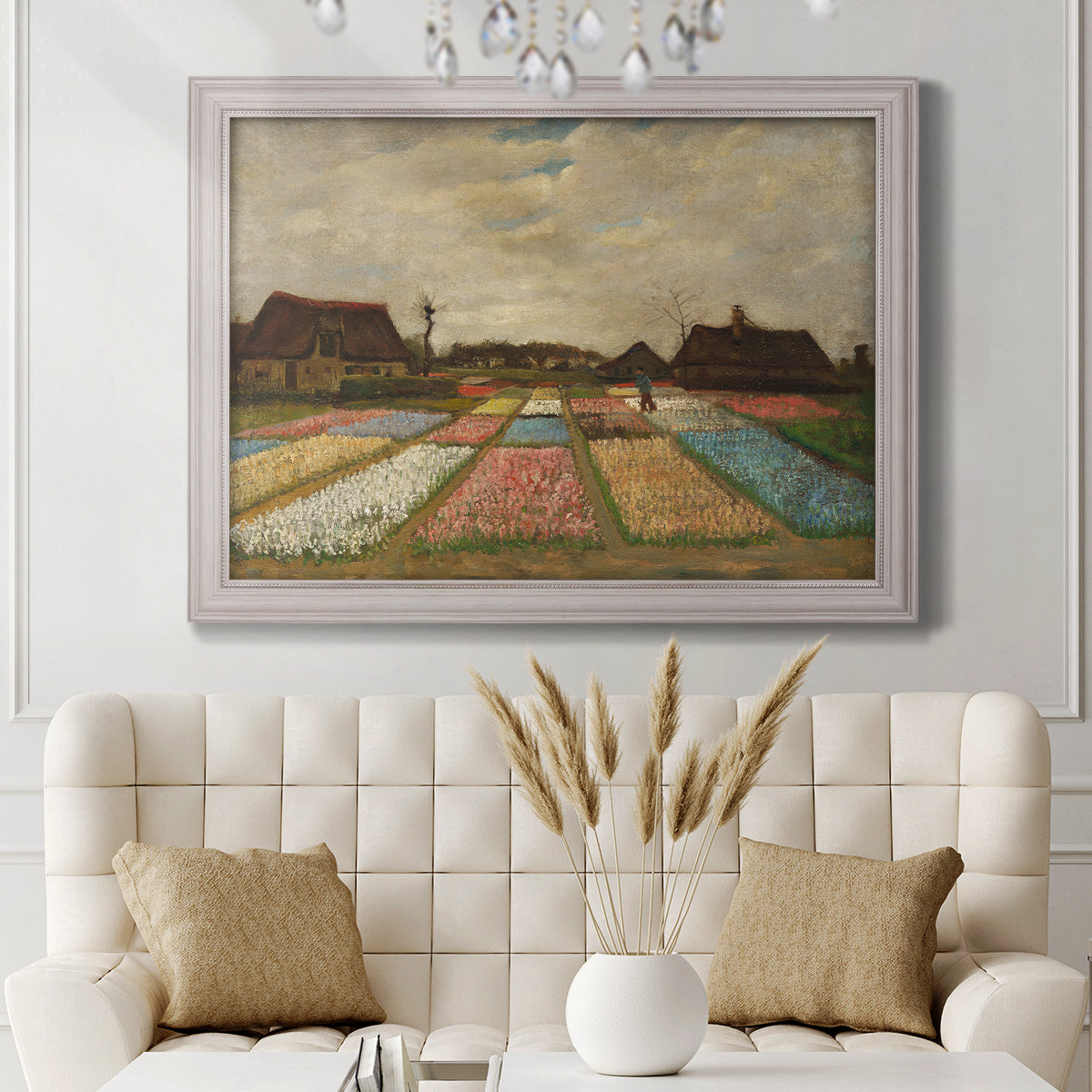 Impressionist Dutch bulb field landscape by Vincent van Gogh in an ornate weathered white frame displayed in a neutral-toned interior setting.