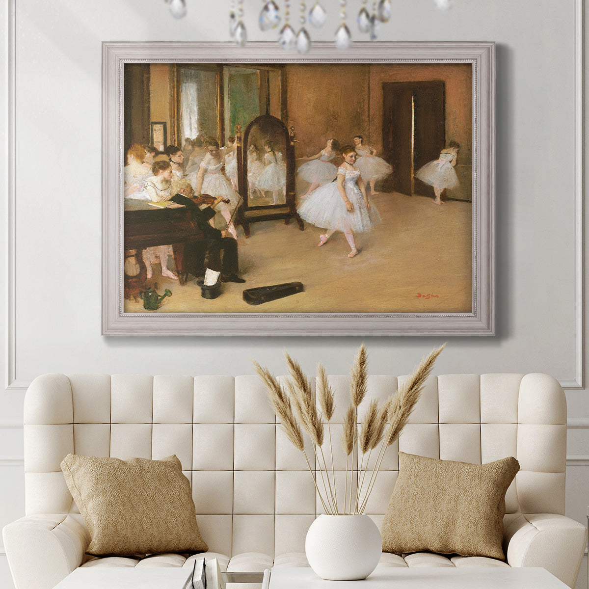 Impressionist dance class interior scene by Edgar Degas in an ornate weathered white frame displayed in a neutral-toned interior setting.