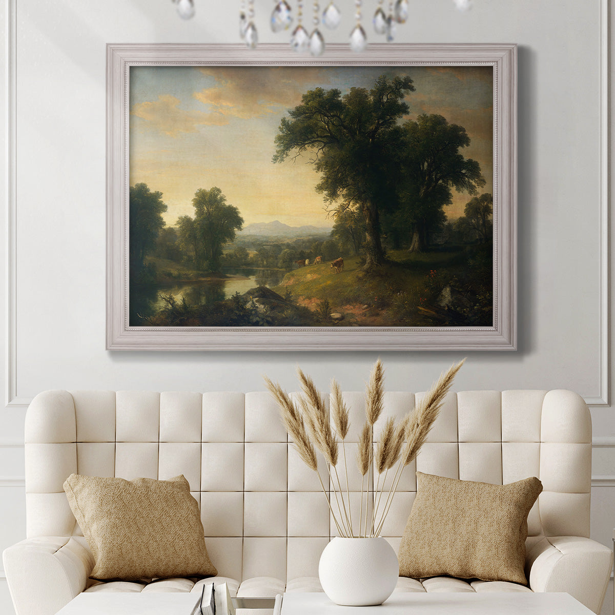Traditional pastoral landscape painting by Asher Brown Durand in an ornate weathered white frame displayed in a neutral-toned interior setting.