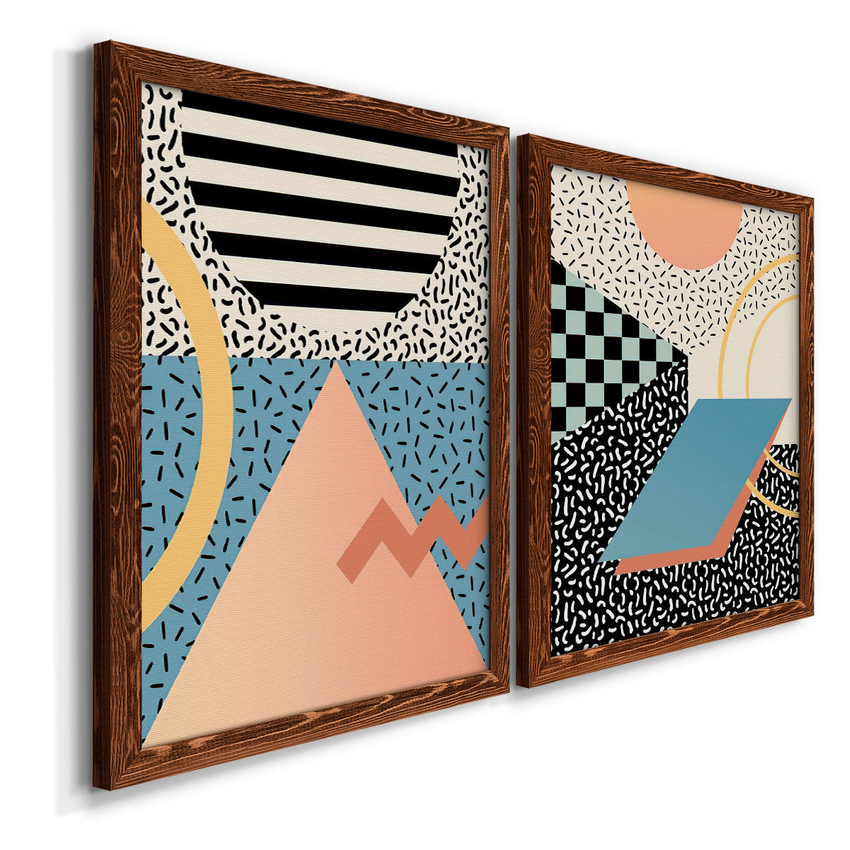 Angled view of a set of two maple barnwood framed canvas prints featuring two retro graphic abstracts featuring bold geometric Memphis-style patterns.