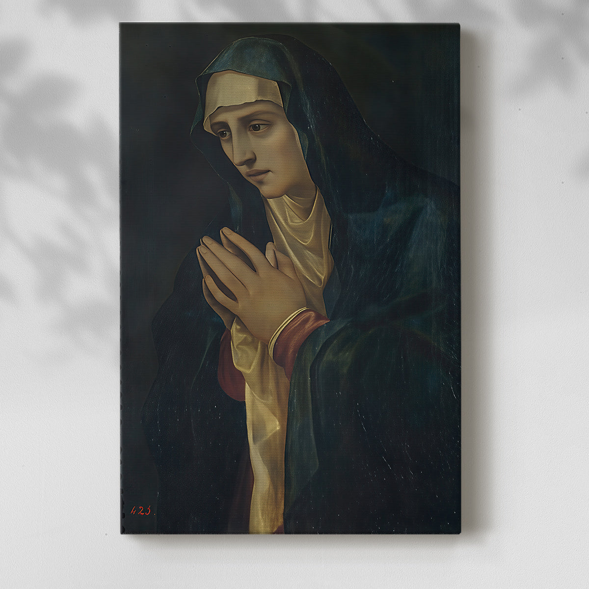 Canvas art print of a serene figure with gentle tones and calm expression with a soft shadow on a white background.