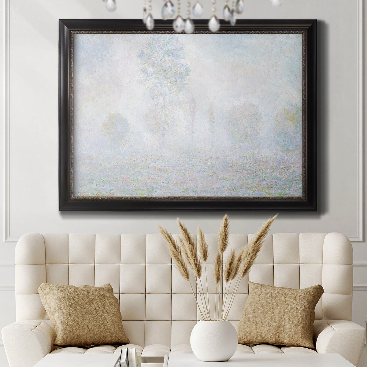 Impressionist atmospheric landscape in morning haze by Claude Monet in an ornate black frame with gilded inner detail displayed in a neutral-toned interior setting.