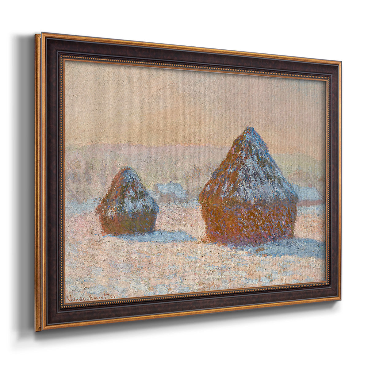 Impressionist winter haystack scene by Claude Monet printed on canvas in an ornate bronzed mahogany wood frame.