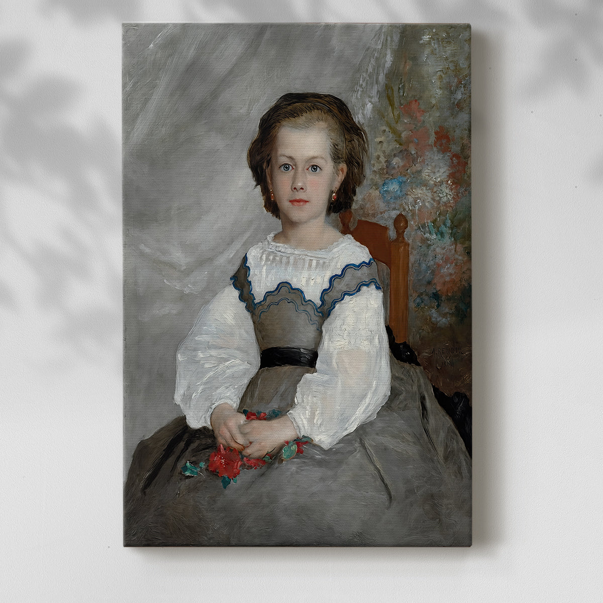 Canvas art print of a refined portrait of a child with subtle color and gentle expression with a soft shadow on a white background.