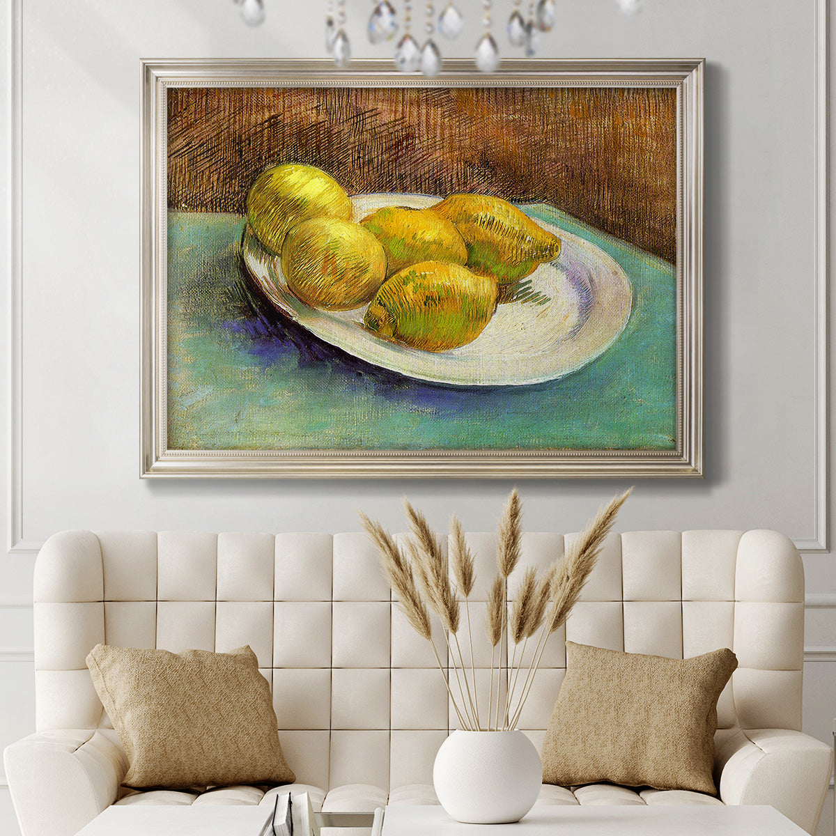 Impressionist still life with lemons by Vincent van Gogh in an ornate champagne frame displayed in a neutral-toned interior setting.