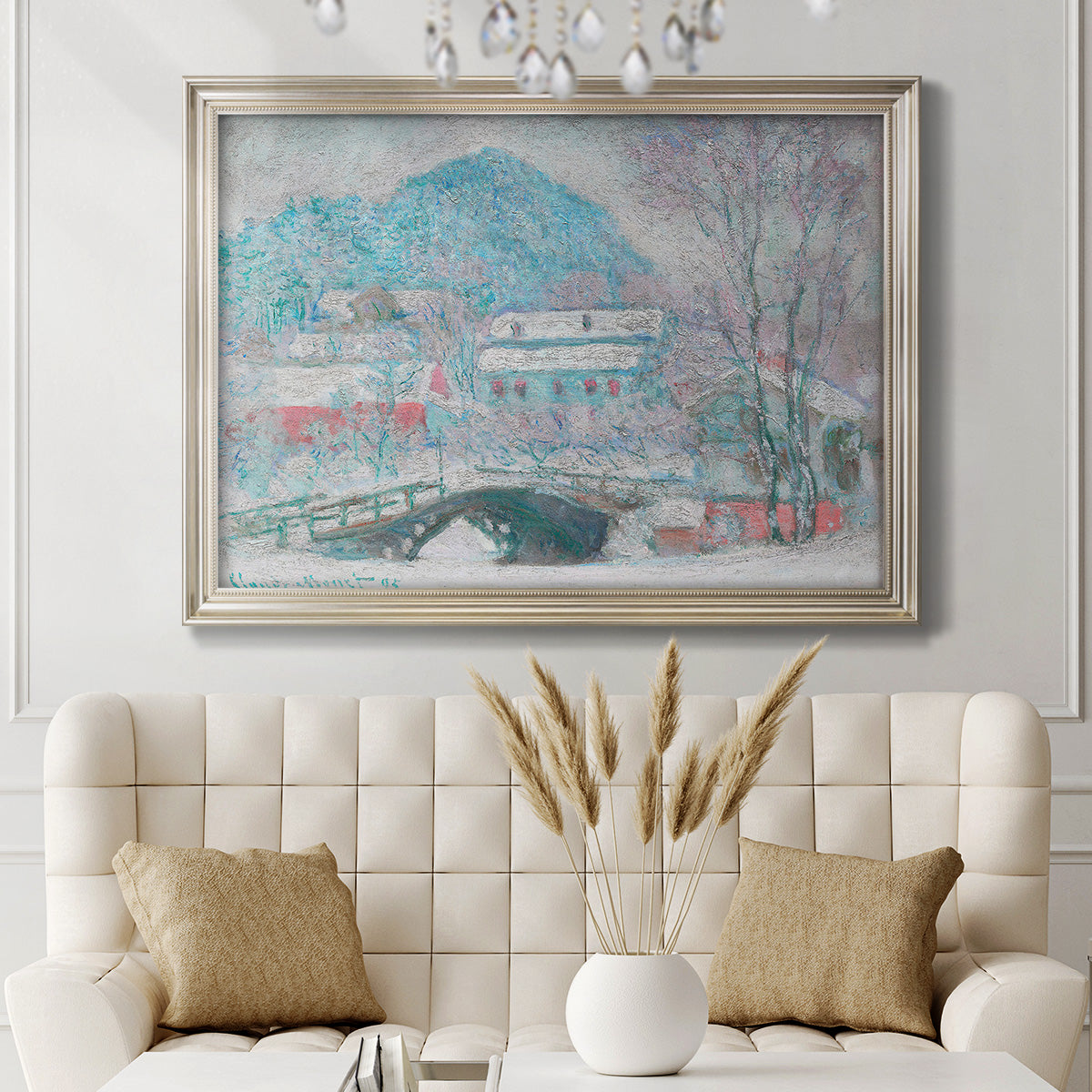 Impressionist coastal village landscape in Norway by Claude Monet in an ornate champagne frame displayed in a neutral-toned interior setting.