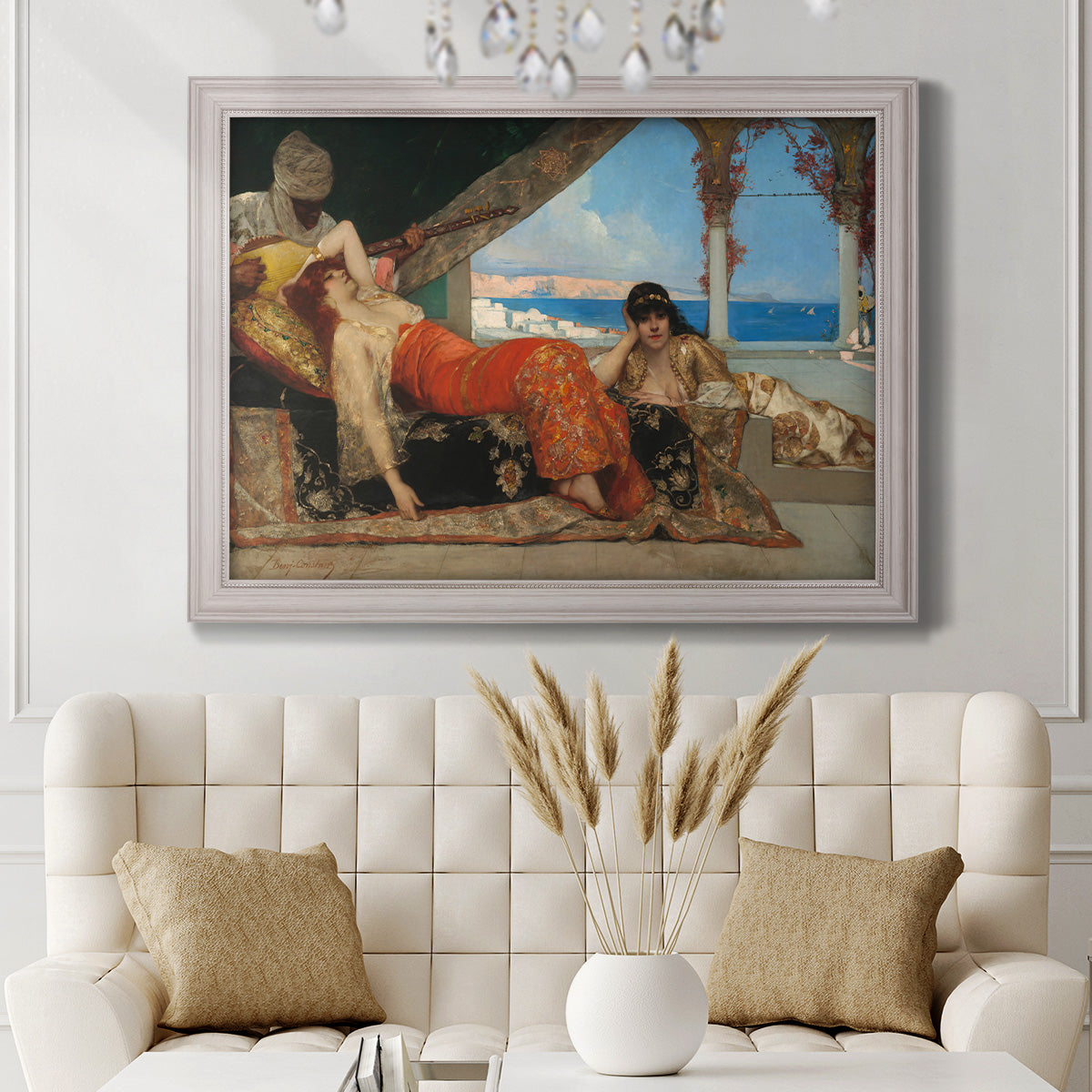 Orientalist portrait scene by Jean-Joseph Benjamin-Constant in an ornate weathered white frame displayed in a neutral-toned interior setting.
