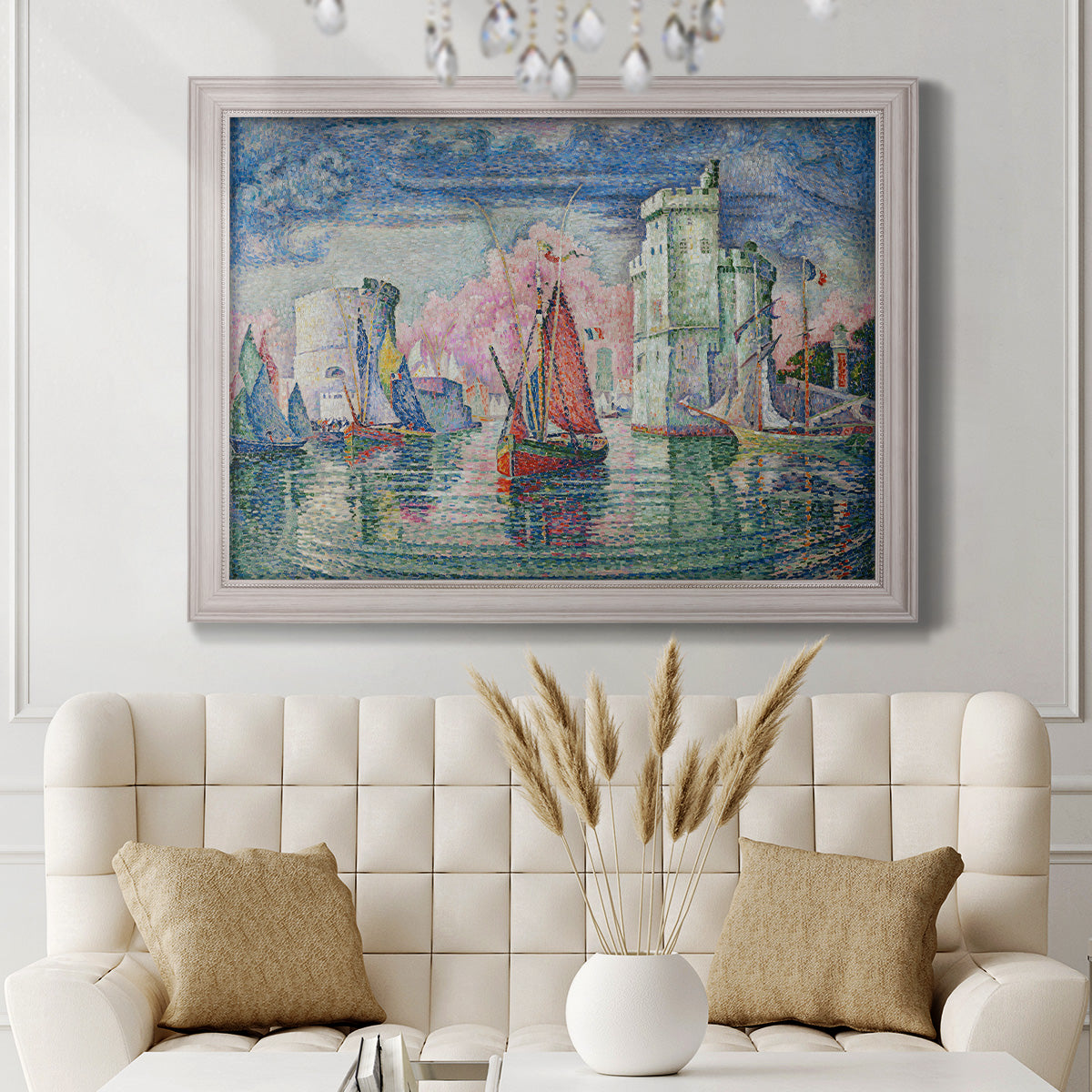 Impressionist harbor scene by Paul Signac in an ornate weathered white frame displayed in a neutral-toned interior setting.