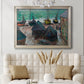 Impressionist coastal beach scene with boats by Claude Monet in an ornate champagne frame displayed in a neutral-toned interior setting.