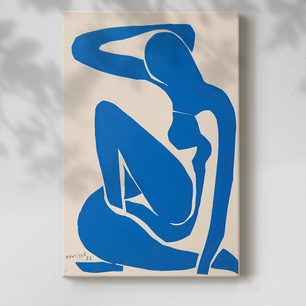 Canvas art print of a stylized body formed from flat geometric pieces with a soft shadow on a white background.