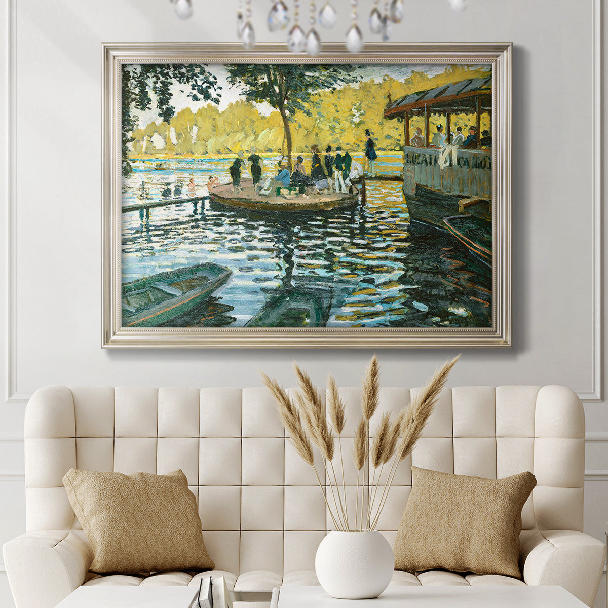 Impressionist riverside leisure scene by Claude Monet in an ornate champagne frame displayed in a neutral-toned interior setting.