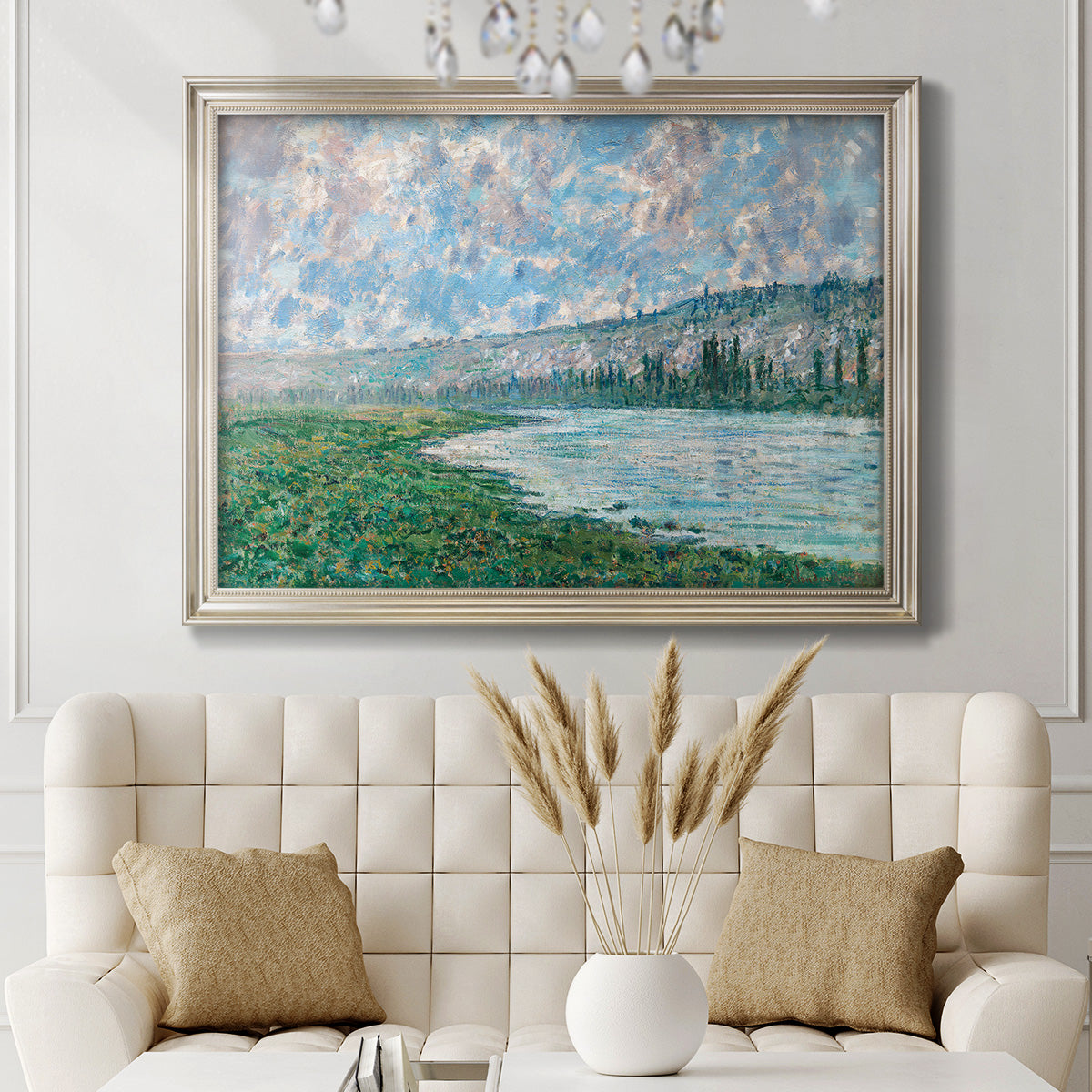Impressionist river landscape at Vétheuil by Claude Monet in an ornate champagne frame displayed in a neutral-toned interior setting.