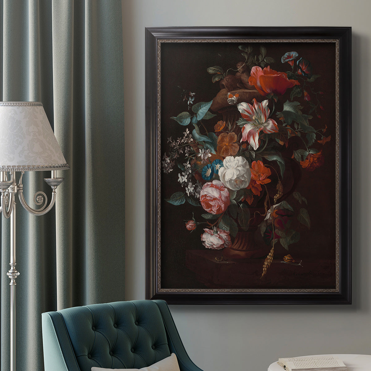 Classical floral still life painting by Jan van Huysum in an ornate black frame with gilded inner detail displayed in a neutral interior setting.