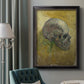 Profile skull study artwork by Vincent van Gogh in an ornate black frame with gilded inner detail displayed in a neutral interior setting.