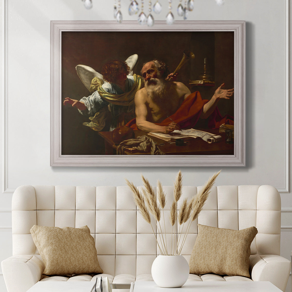 Classical religious painting of Saint Jerome with an angel by Simon Vouet in an ornate weathered white frame displayed in a neutral-toned interior setting.