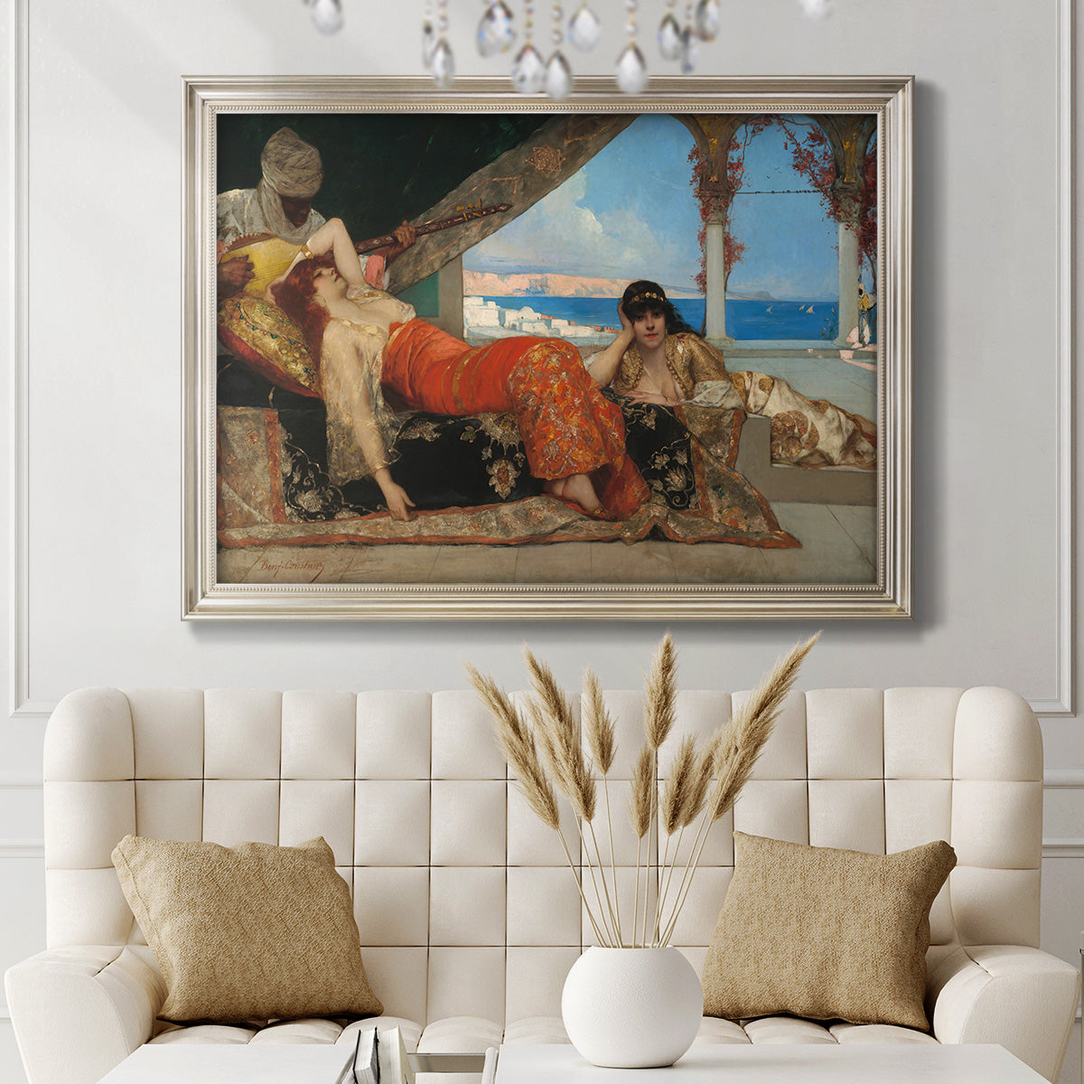 Orientalist portrait scene by Jean-Joseph Benjamin-Constant in an ornate champagne frame displayed in a neutral-toned interior setting.