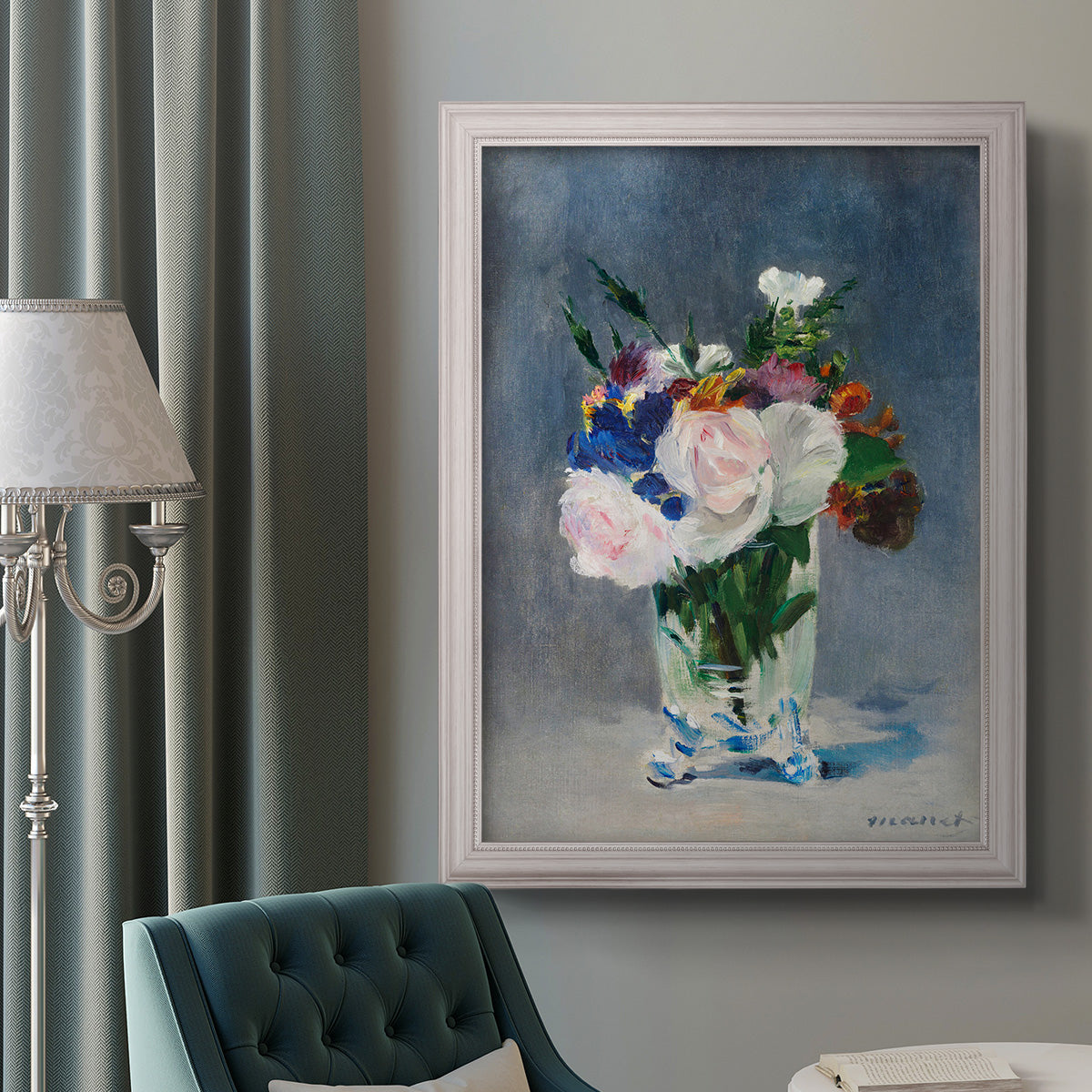 Impressionist floral still life painting by Claude Monet in an ornate weathered white frame displayed in a neutral interior setting.
