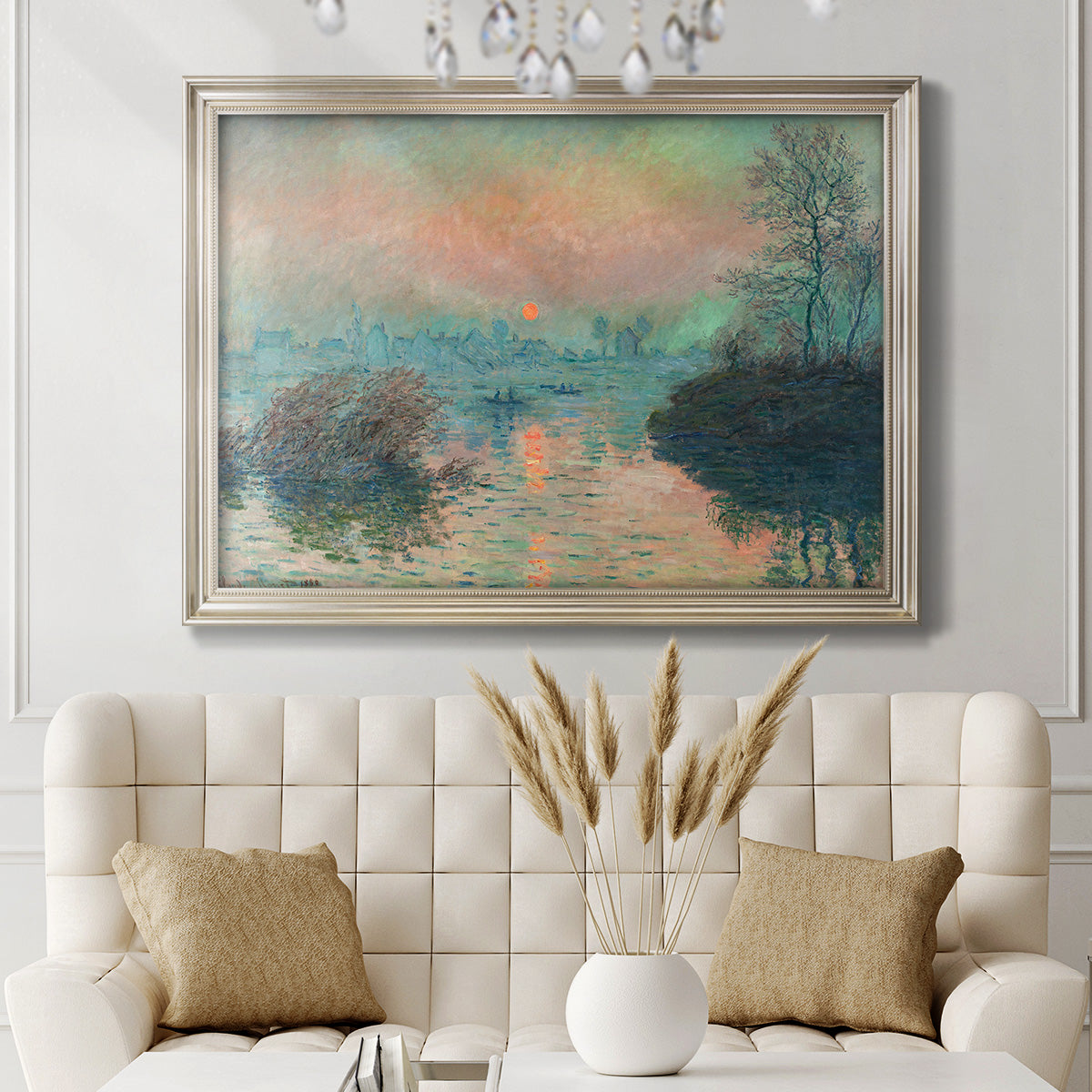 Impressionist winter river sunset scene by Claude Monet in an ornate champagne frame displayed in a neutral-toned interior setting.