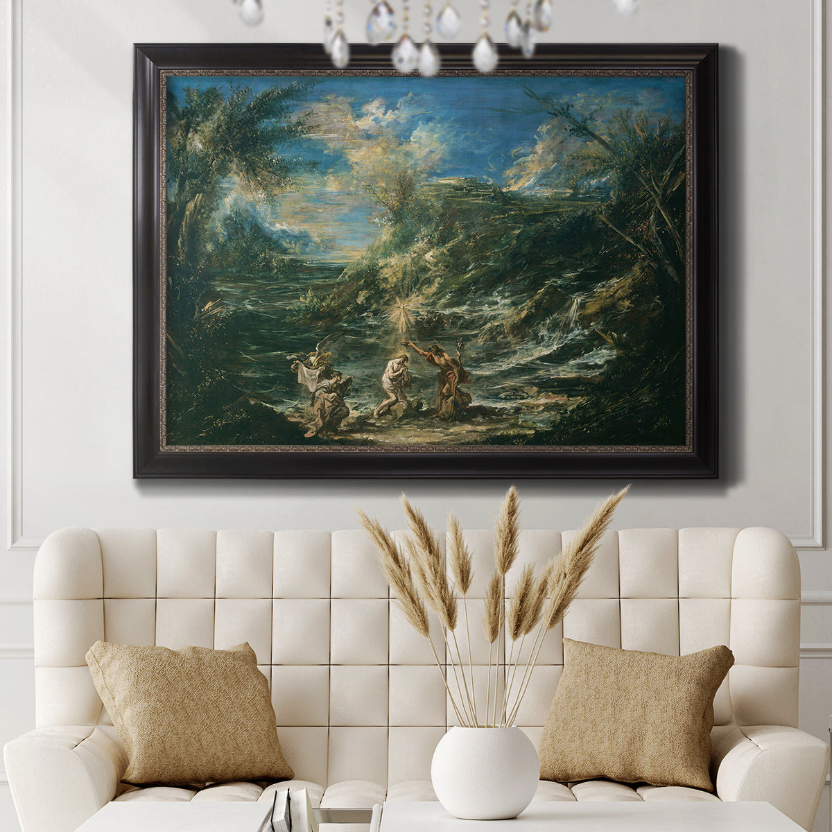 Religious landscape depicting the baptism of Christ by Alessandro Magnasco in an ornate black frame with gilded inner detail displayed in a neutral-toned interior setting.