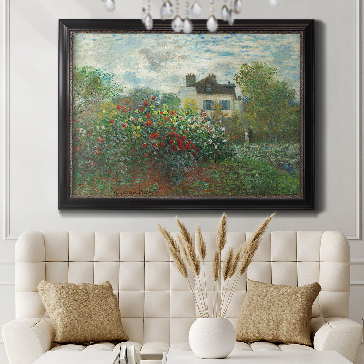 Impressionist garden landscape at Argenteuil by Claude Monet in an ornate black frame with gilded inner detail displayed in a neutral-toned interior setting.