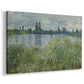 Canvas art print featuring an impressionist view of Seine with reflections and greenery, displayed at an angle