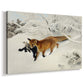Canvas art print featuring a wildlife scene of fox moving swiftly through winter terrain, displayed at an angle