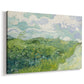 Canvas art print featuring a post-impressionist countryside scene with layered fields and horizon, displayed at an angle