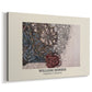 Canvas art print featuring a decorative floral pattern with looping stems and layered foliage, displayed at an angle