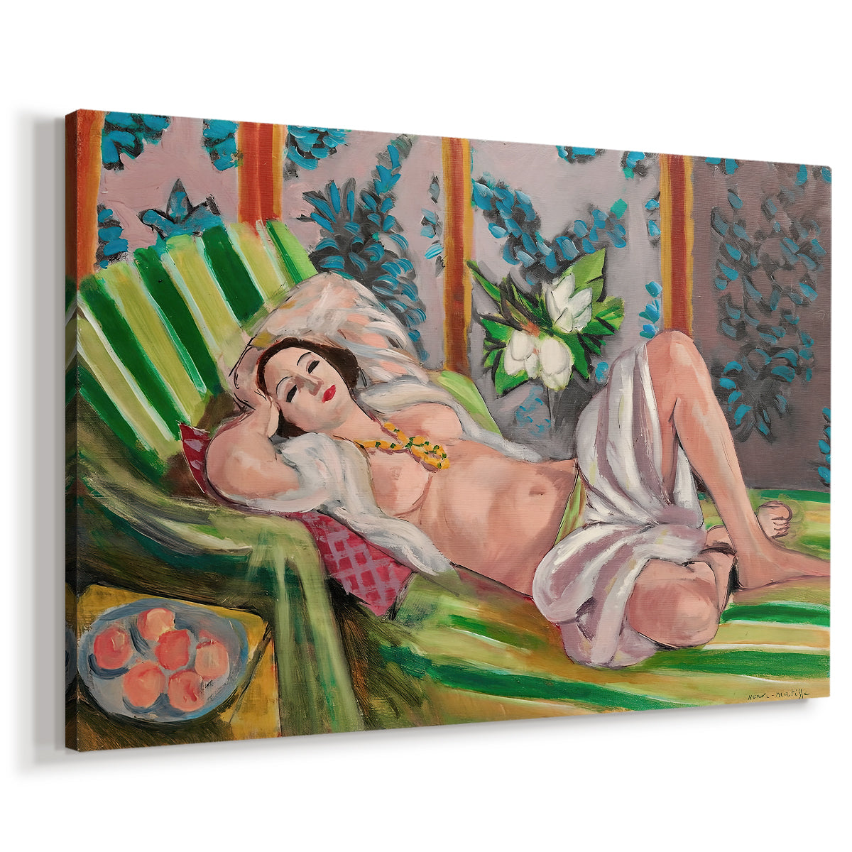 Canvas art print featuring a woman lying on patterned textiles in a vivid decorative setting, displayed at an angle