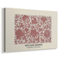 Canvas art print featuring a decorative design combining botanical motifs with structured layout, displayed at an angle