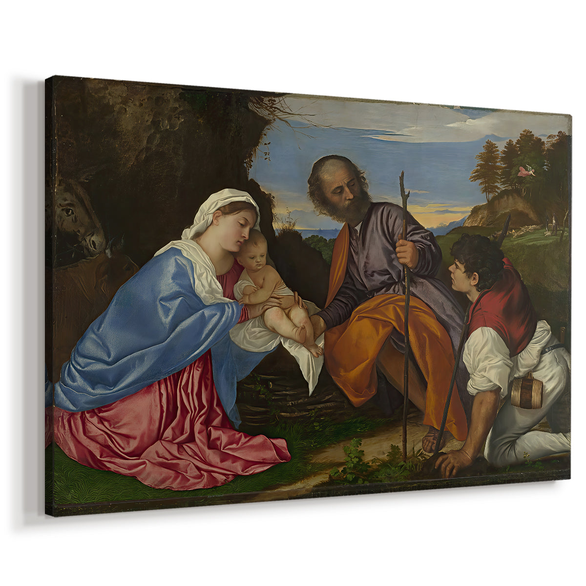 Canvas art print featuring a religious scene with seated figures and child in pastoral environment, displayed at an angle